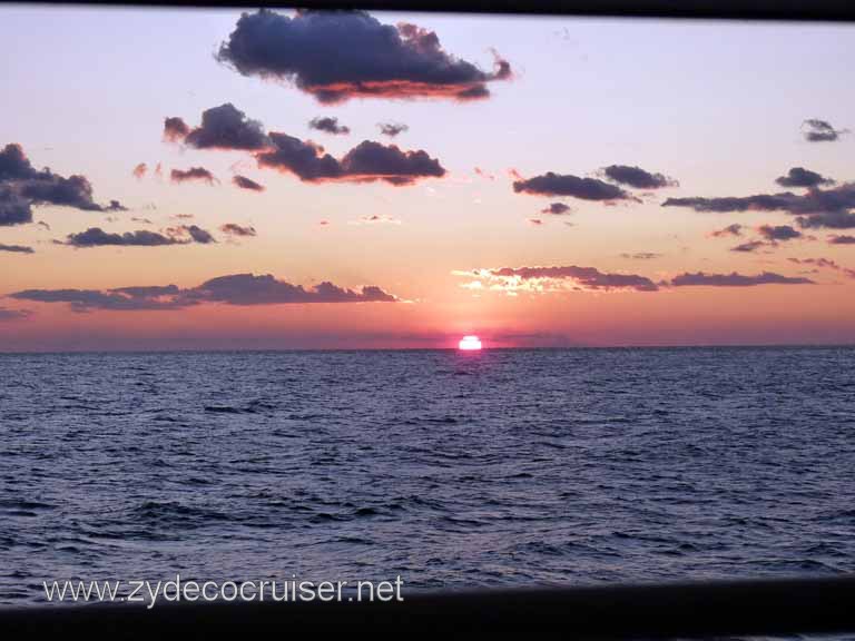 4678: Carnival Dream - Sunset from our Cove Balcony