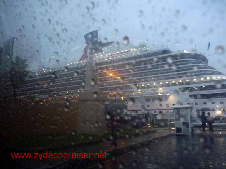 5076: Carnival Dream in a rainy Messina. Leaving on our private tour bus.