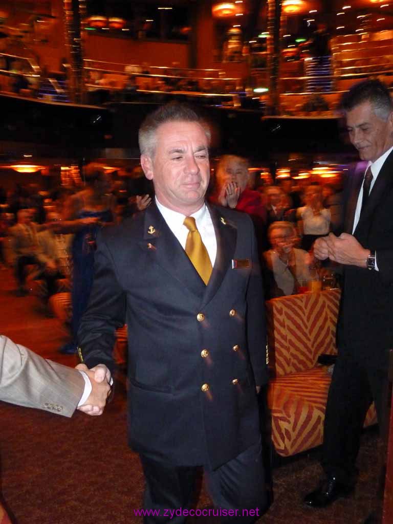 5664: Carnival Dream - Past Guest Party - Captain Carlo Queirolo looking a little stressed after a long day of bad weather.