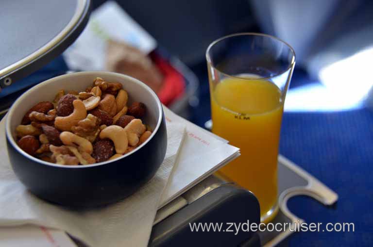 021: KLM Flight 670, DFW - AMS, Apr 29, 2011, World Business Class, The Orange Juice was tasty and the nuts were, nuts.